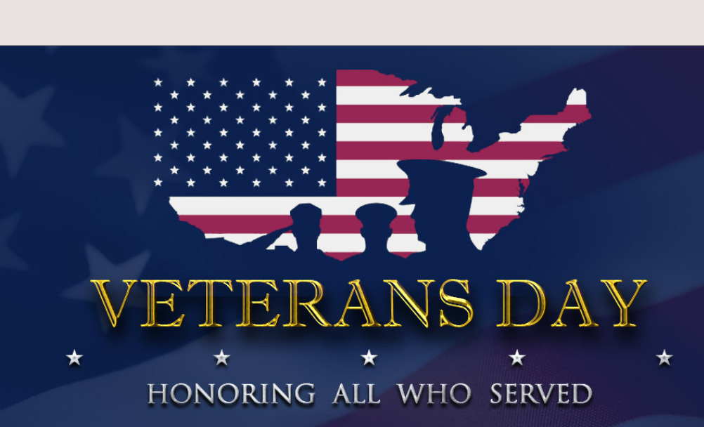 Veterans Day graphic featuring a U.S. map with the flag and silhouettes of military personnel. Text reads, "Veterans Day Honoring All Who Served.